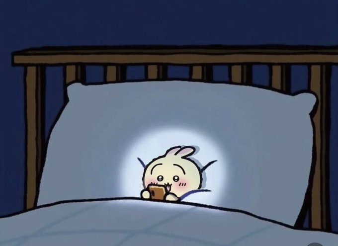 夜中にスマホを見るうさぎ のAI生成画像